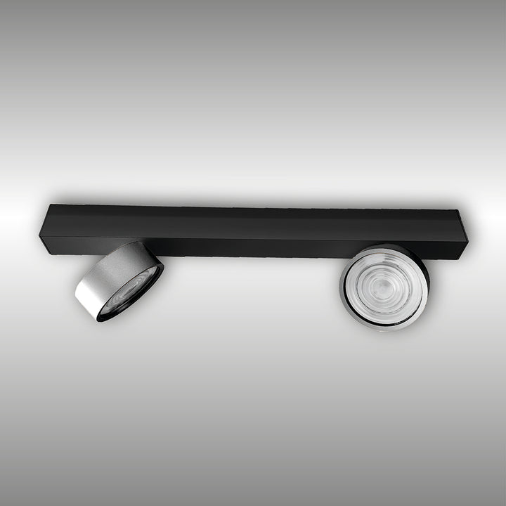 Projecteur à deux lumières Swing monté en surface