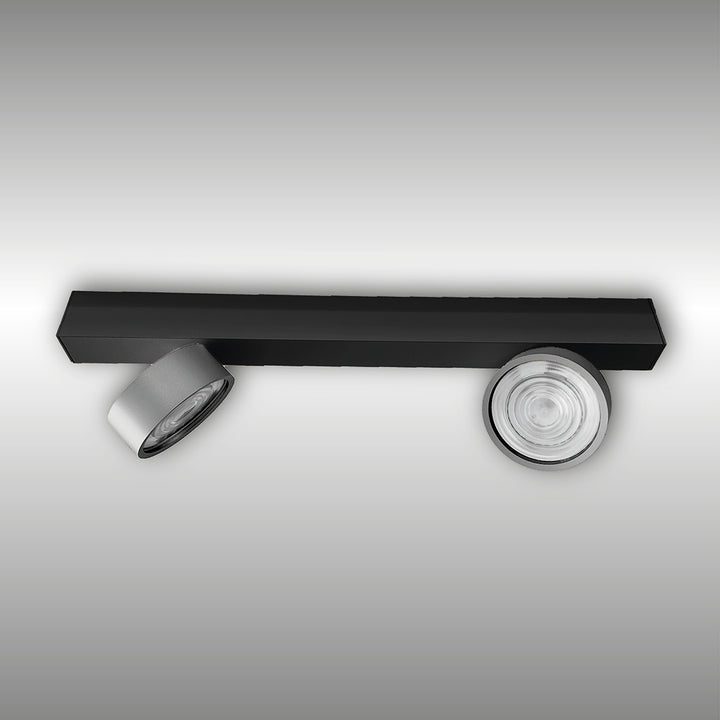 Projecteur à deux lumières Swing monté en surface